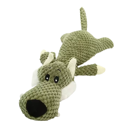 Hund tygger på ChewChamp krammedyr