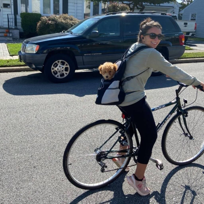 Fietsen met hond in BuddyPack rugzak